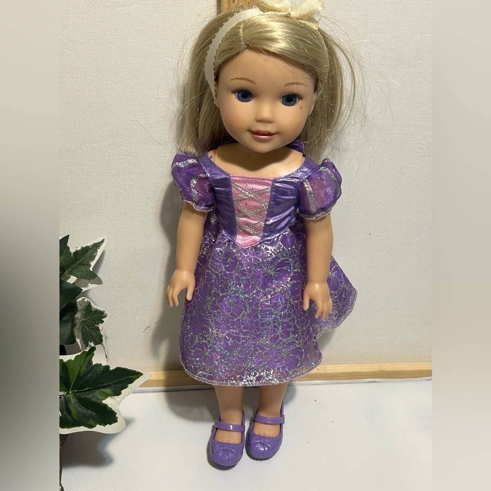 American Girl Doll in Sparkly Purple Dress